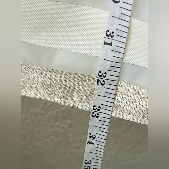 Jonathan Michelle dress size 12
17” across chest pit to pit loose on the waist - Picture 12 of 14